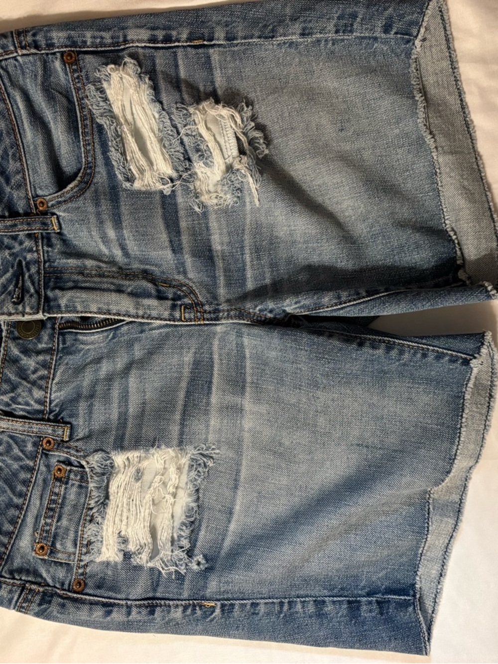 American Eagle Outfitters Blue Denim Shorts with Leather Logo Patch